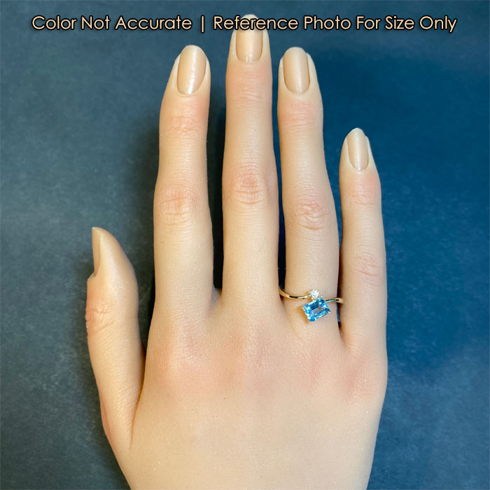 aquamarine ring on hand