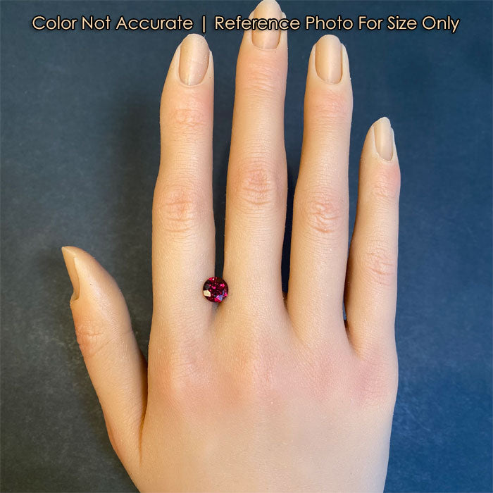 red garnet gemstone size on hand