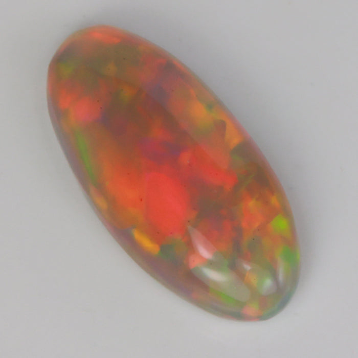 semi black oval cabochon cut opal gemstone