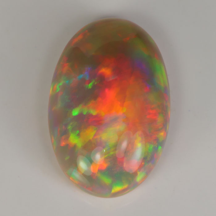 semi black opal gemstone oval cut