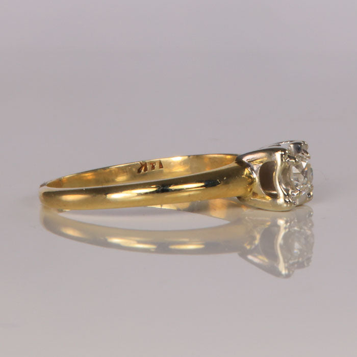 diamond ring in yellow and white gold