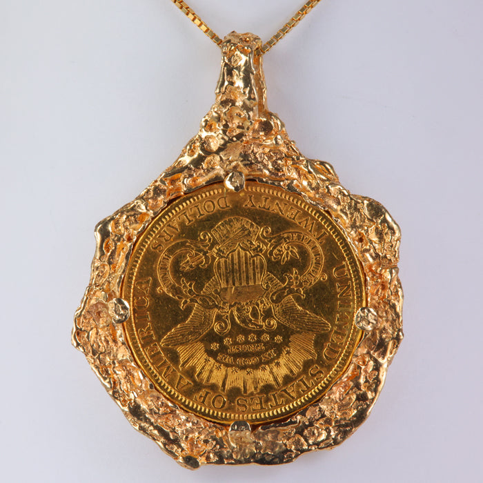 1878 coin with .97oz pure 24k gold set in 14k yellow gold