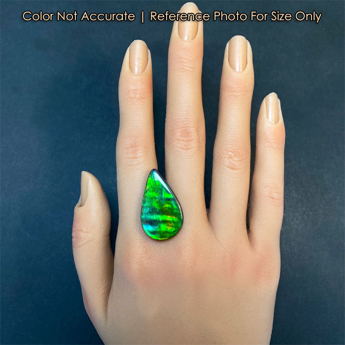 pear ammolite gemstone on hand