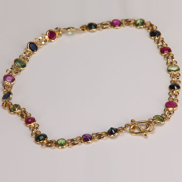 sapphire and ruby bracelet in yellow gold