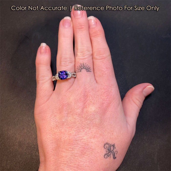 size of platinum tanzanite gemstone and diamond ring