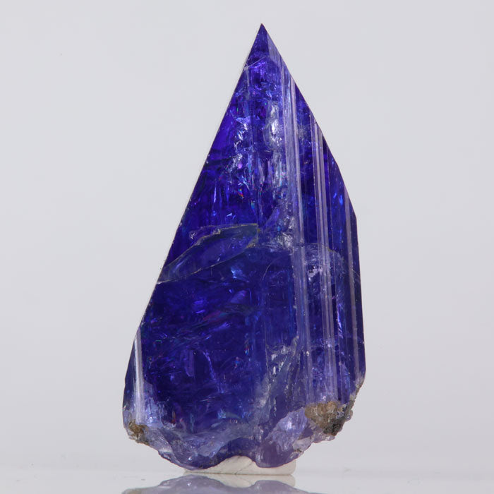 saturated deep violet blue tanzanite crystal specimen