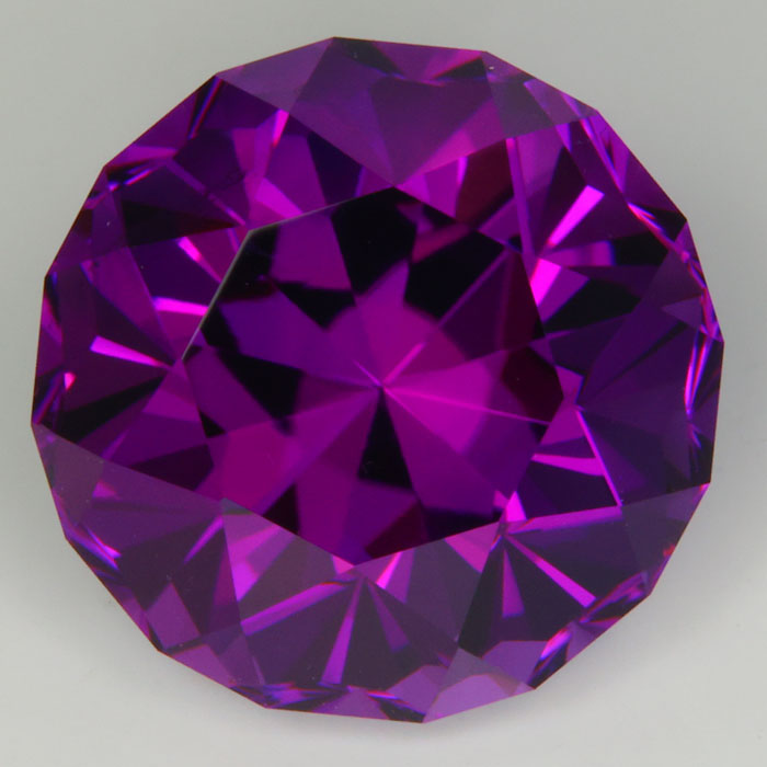 round custom cut purple amethyst from Brazil