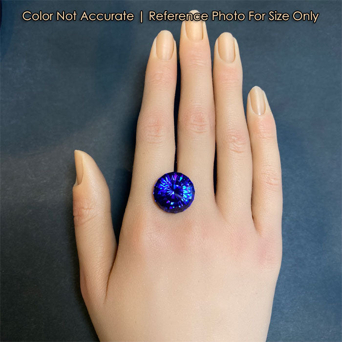 beautiful large tanzanite round stepped cut on hand