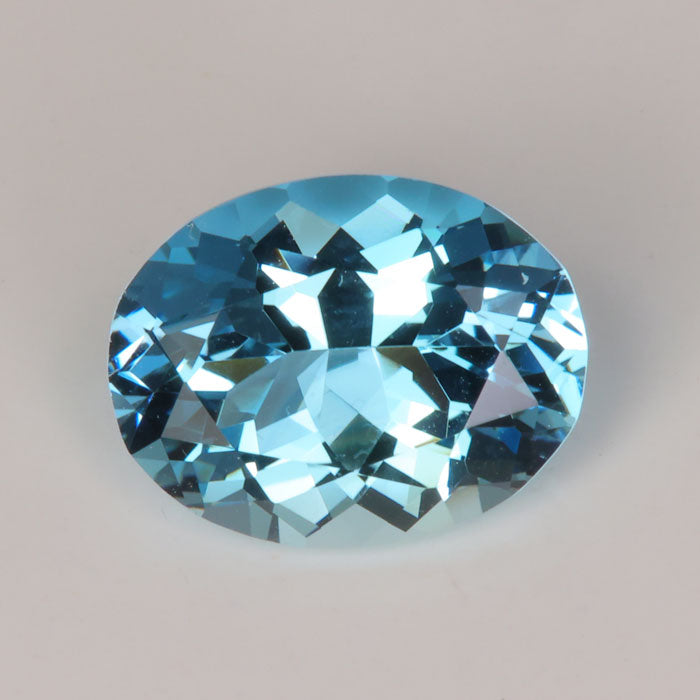 greenish blue oval portuguese round cut gemstone