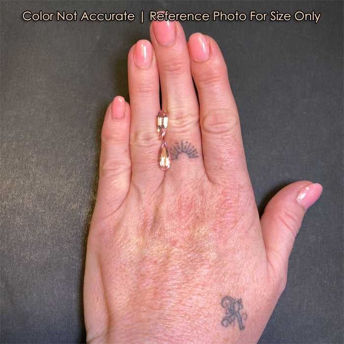peachy morganite pair size to hand