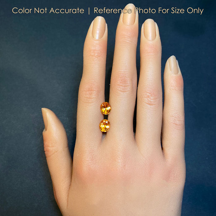 oval cut spessartite garnet pair size on hand