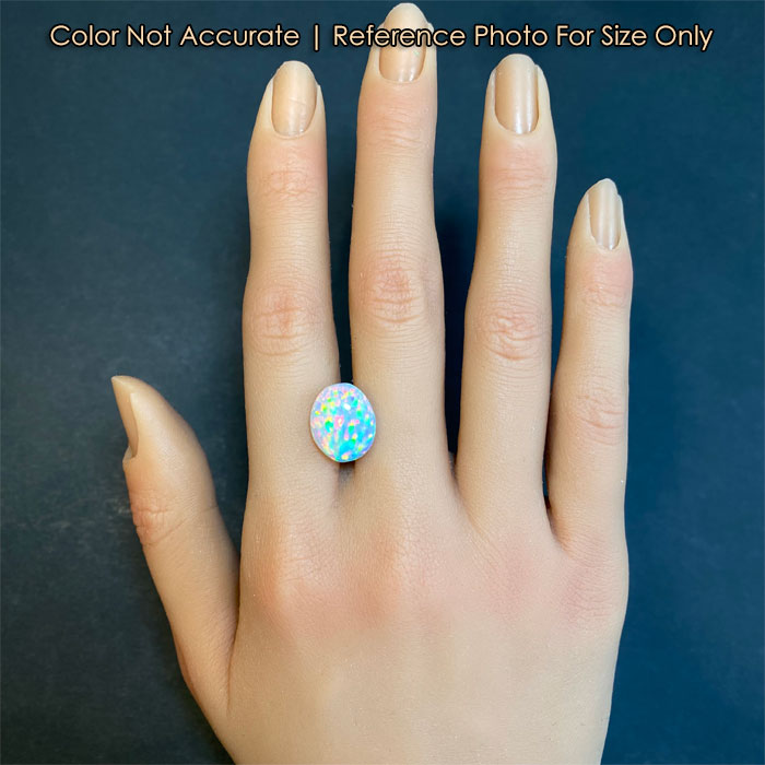 opal oval cut on hand for size