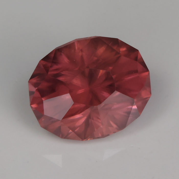 oval cut zircon brownish pink color gemstone