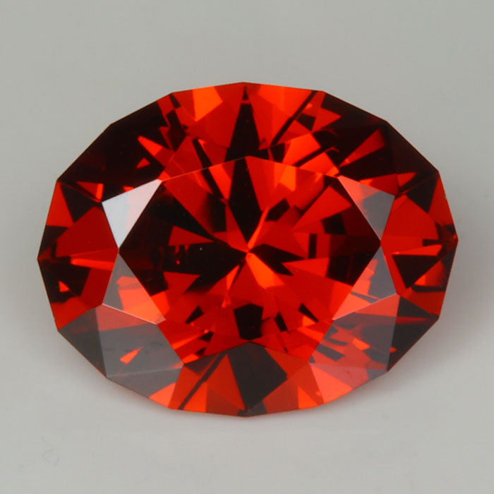 reddish orange oval cut spessartite garnet