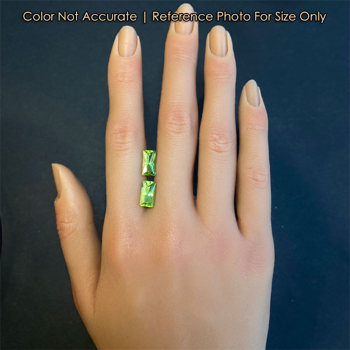 pair of peridot gems size on hand