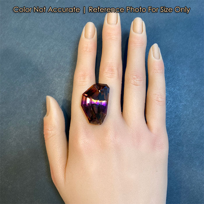 freeform ametrine gemstone on hand size reference