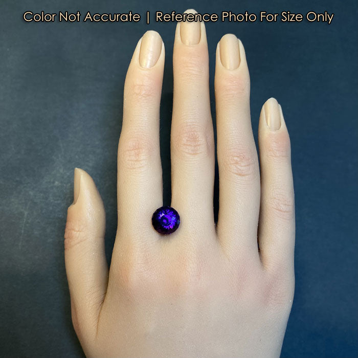 amethyst purple gemstone on hand size