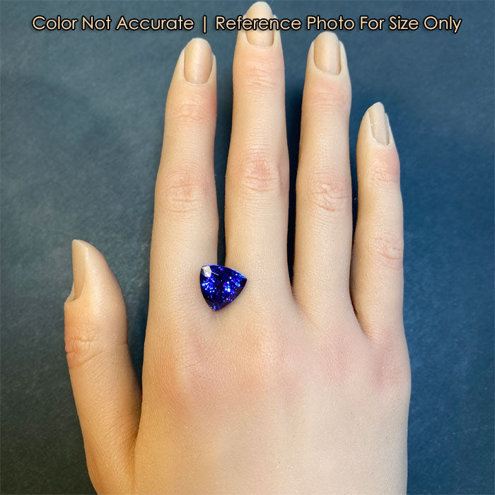 trilliant tanzanite gemstone rare on hand size