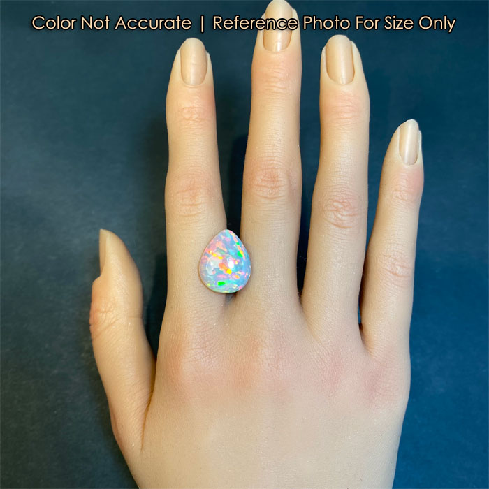 opal gemstone pear shape size on a hand