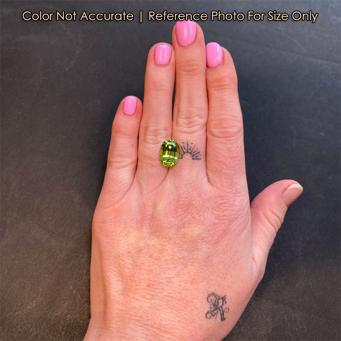 antique cushion green peridot gem