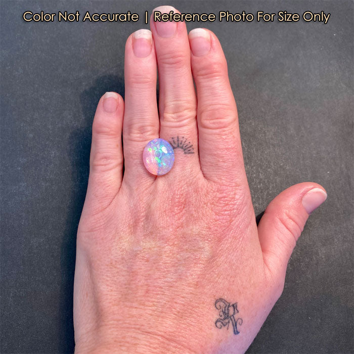 opal gemstone oval cut on hand size