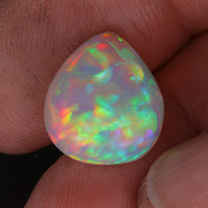 opal gem in hand