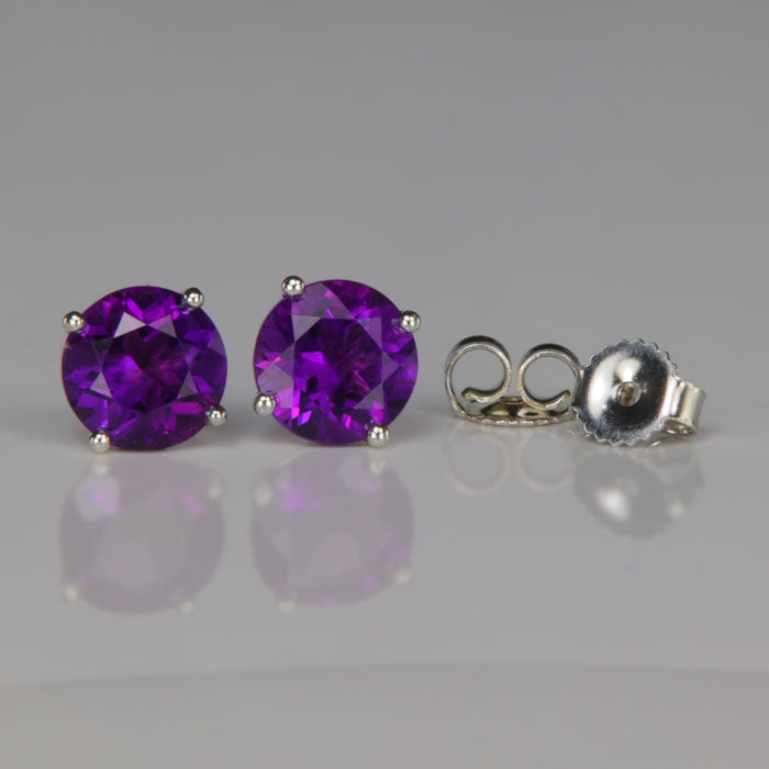 purple color round brilliant cut amethyst and white gold earrings