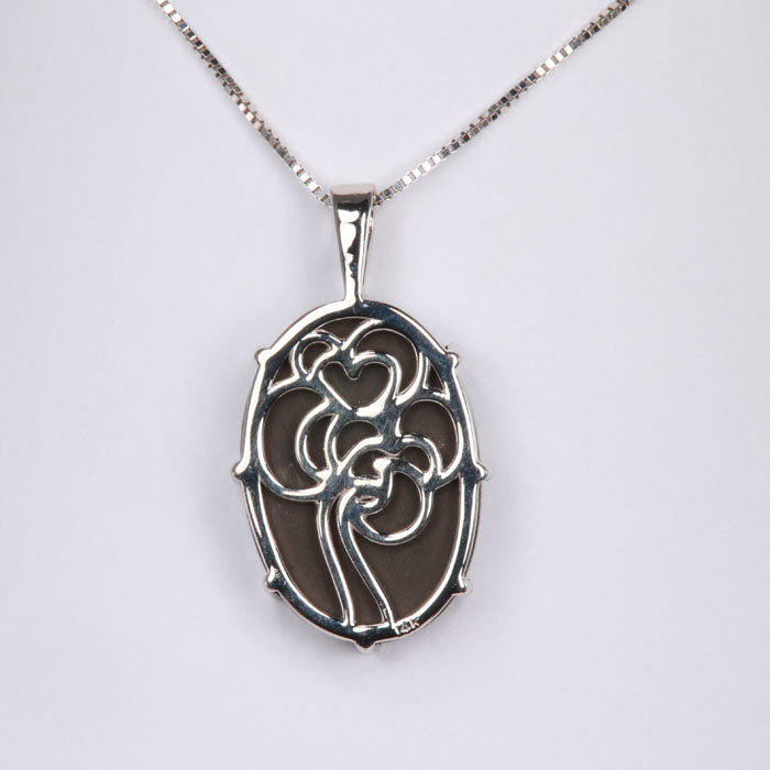 ammolite white gold pendant