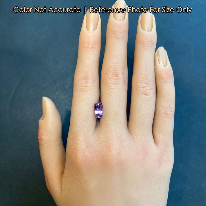 purple color spinel gem on hand