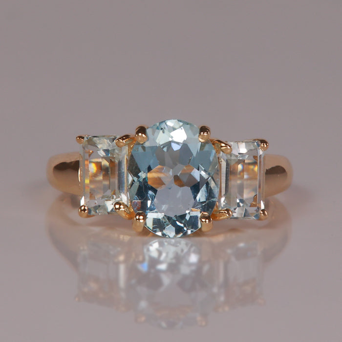 aquamarine and goshenite gemstone ring in yellow gold