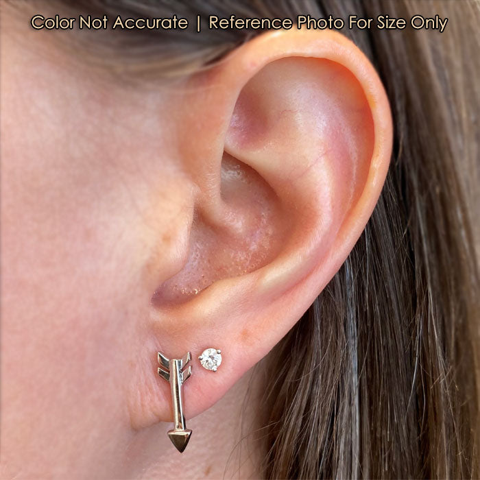 sterling silver arrow studs on ear
