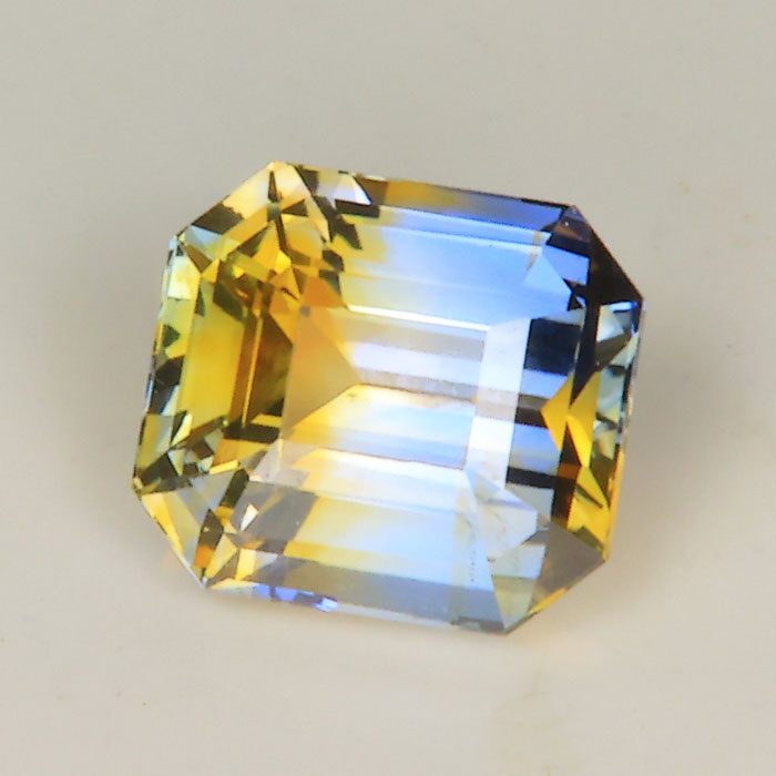 bicolor emerald sapphire gemstone yellow and blue