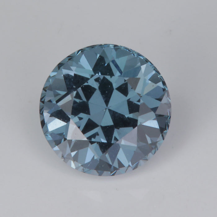 round brilliant blue grey spinel gem