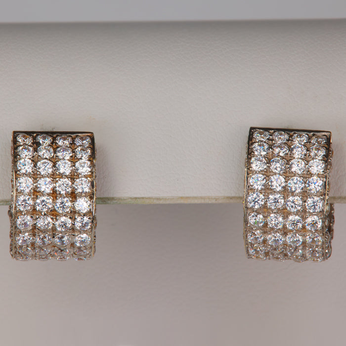 yellow gold huggie hoop earrings with cubic zirconia
