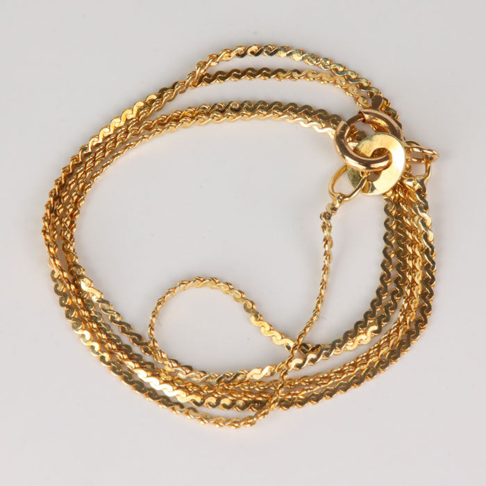 yellow gold serpentine link estate chain