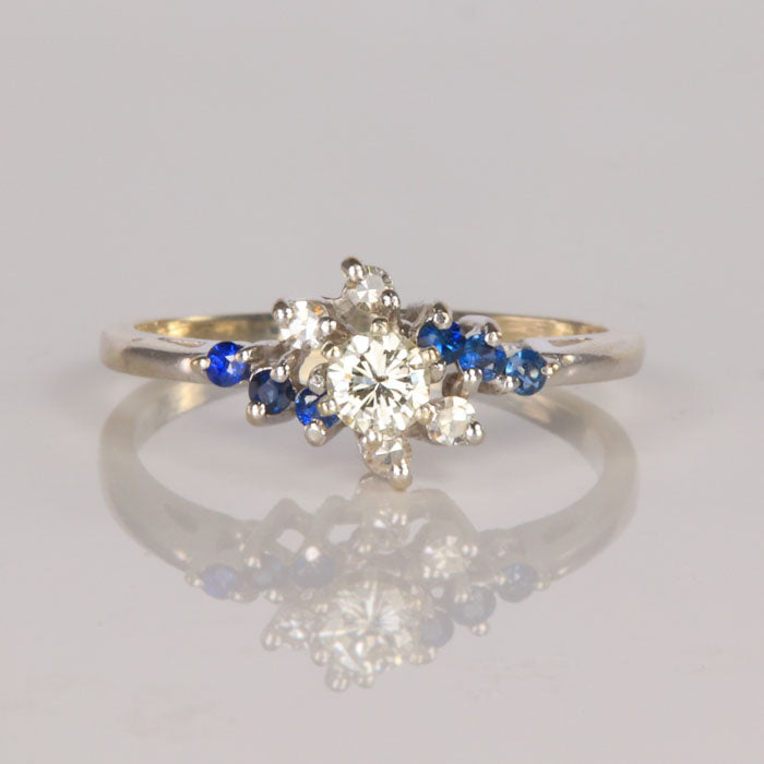 cluster ring with diamonds and sapphires in white gold