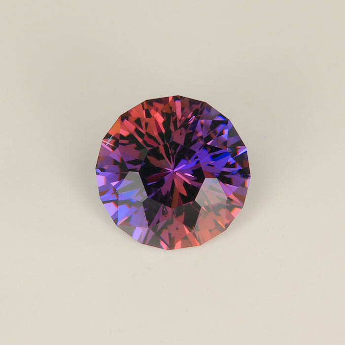 diesel natural fancy tanzanite round brilliant gemstone