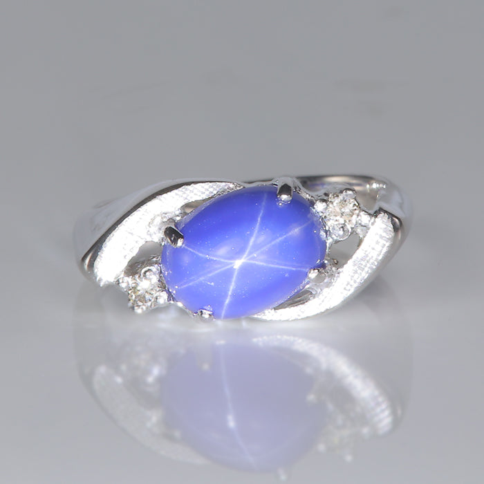 vintage east west synthetic star sapphire ring with diamonds
