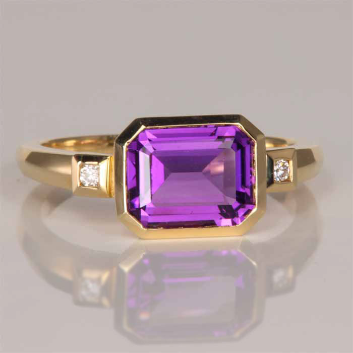 emerald cut bezel set amethyst ring