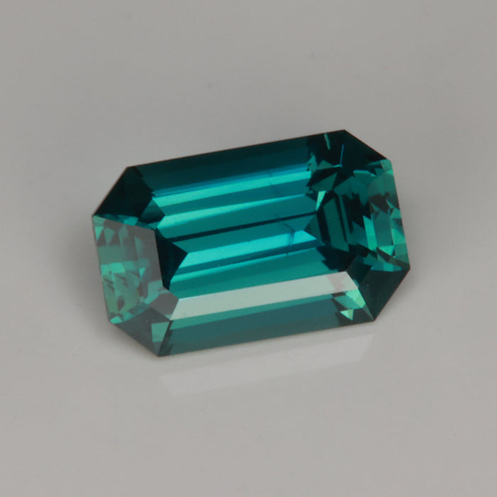 blue green emerald cut sapphire