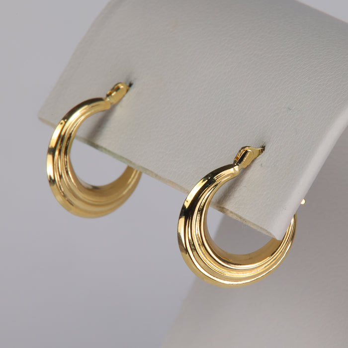 yellow gold hoop earrings with ridge detail