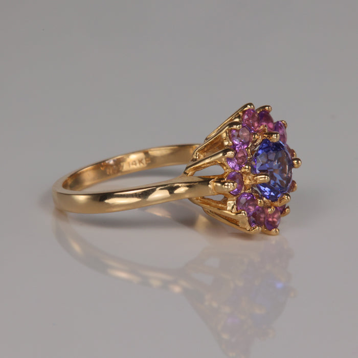 yellow gold estate ring with synthetic tanzanite and amethyst gems