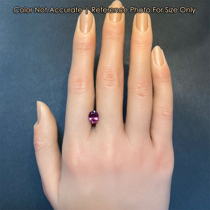 oval cut pink garnet gem