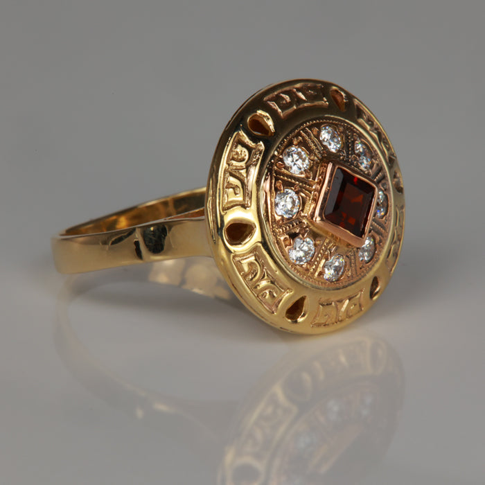 garnet gemstone ring in yellow gold