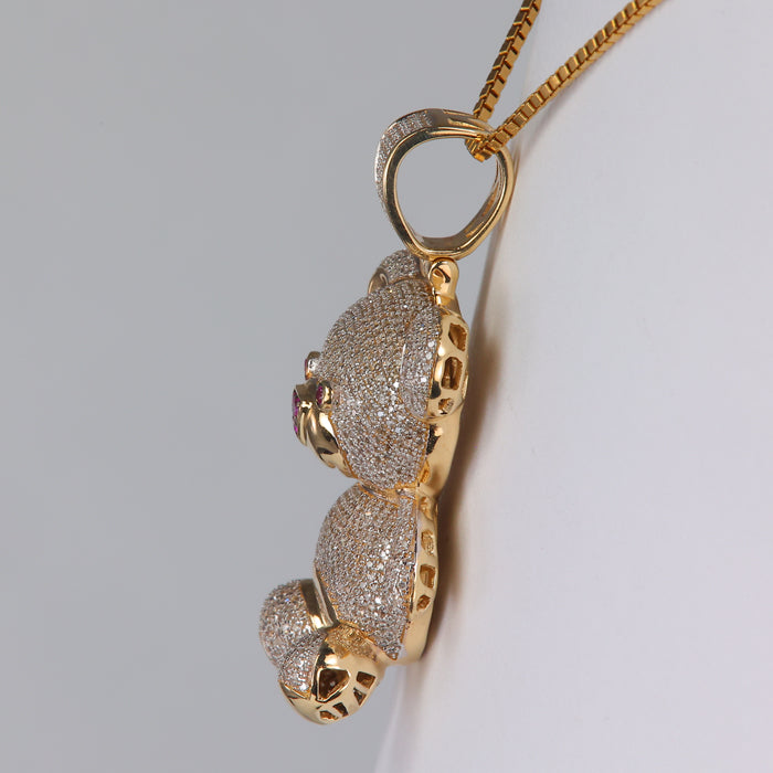 yellow gold diamond and synthetic pink sapphire gemstone bear pendant