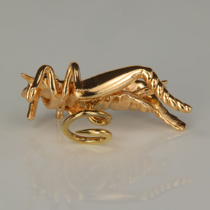 estate lapel pin with grasshopper