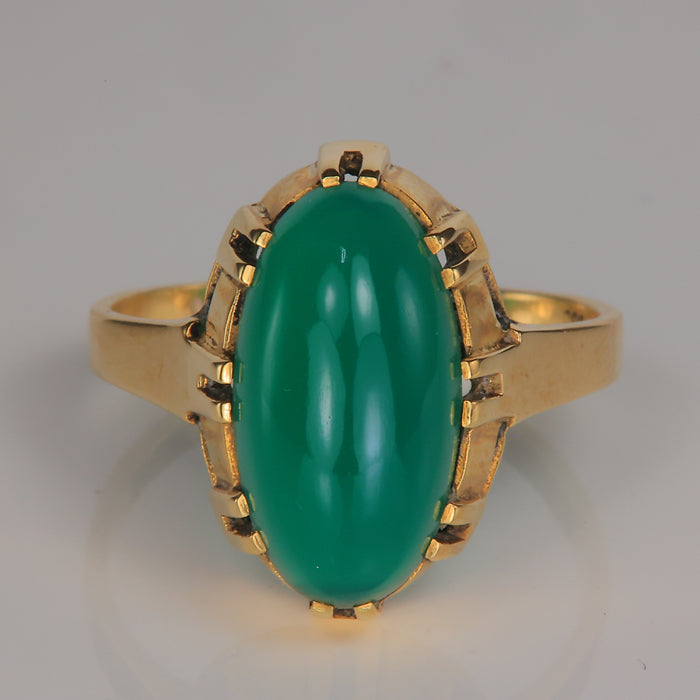 yellow gold art decor style ring with green oval glass gem