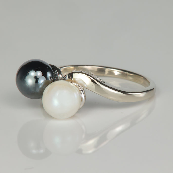 white gold ring with pearl and hematite