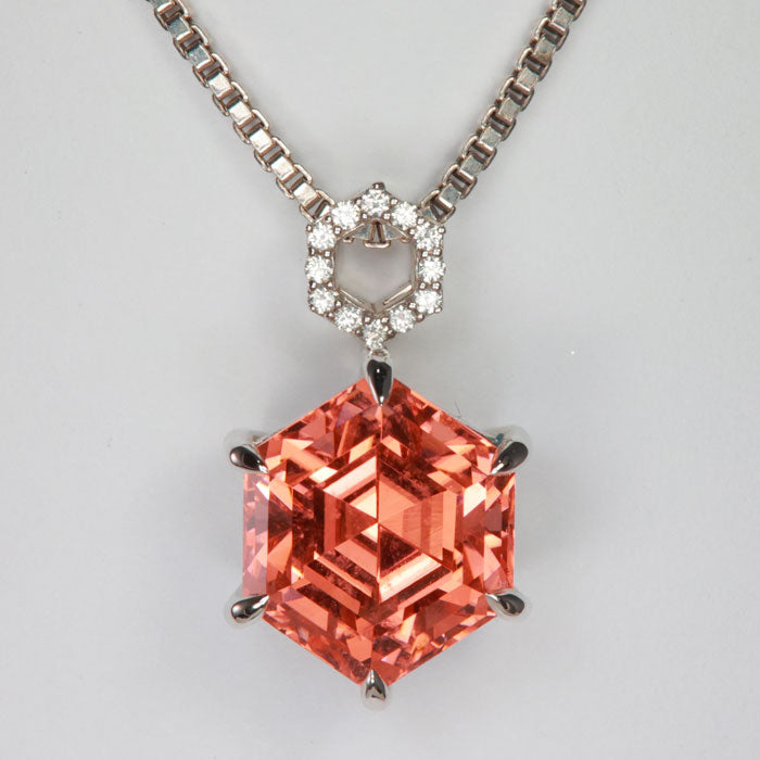 orange pink tourmaline gemstone pendant with diamonds in white gold