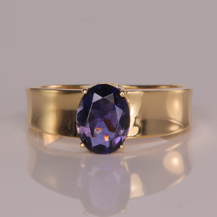 Yellow gold oval cut bluish purple iolite gemstone ring